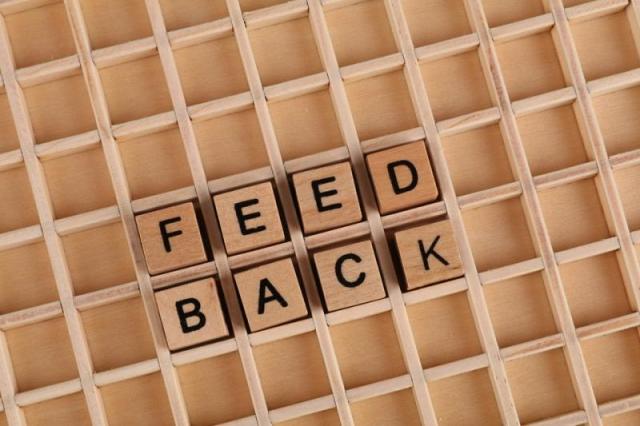 The word feedback spelled in blocks